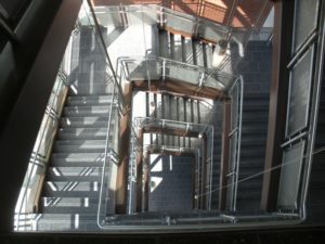CIRCUM Round balustrade with perforated stainless steel infill panels