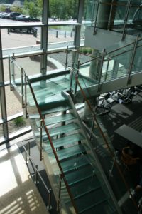 Circum round balustrade on a glass stair