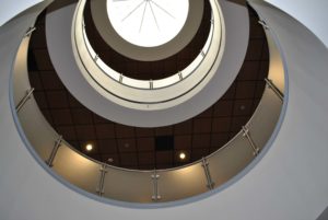 Circum Round curved balustrade with opaque glass infill panels